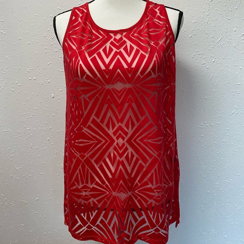 Get festive ready with this bright red geometric tank.